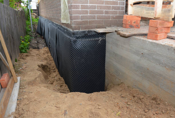 SJ Waterproofing Pros technician performing targeted Interior Drainage System assessment in Whippany, NJ